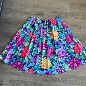 High waisted floral skirt. Size L with elastic band so can fit other sizes
